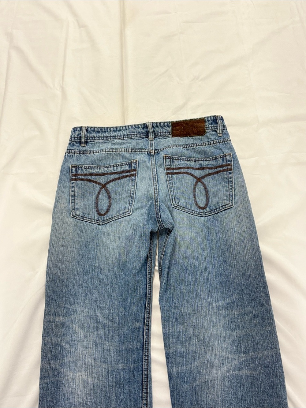 Y2K 2000s style Embroidered Stained Blue Baggy Jeans | $26.99